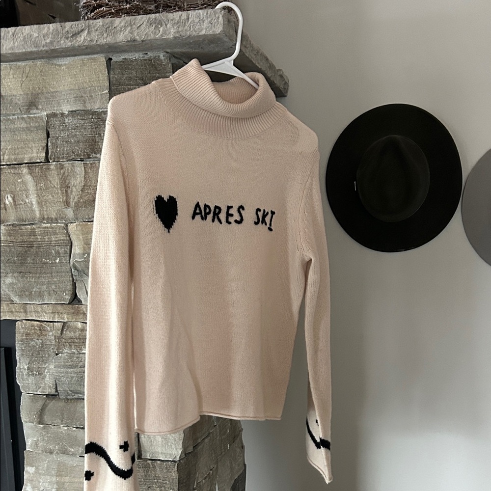 Lisa Todd Cream Turtleneck with Black Apres Ski Design